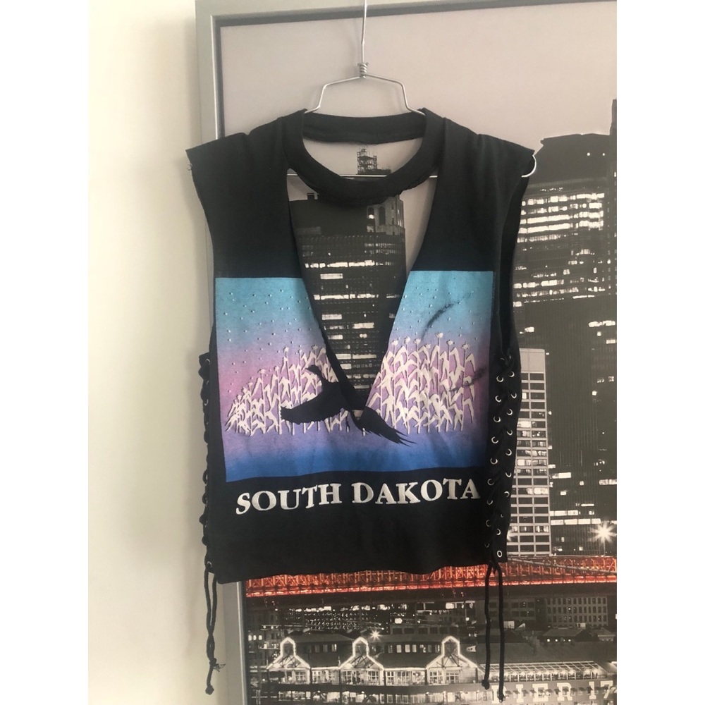 Sleeveless, deep V-neck top